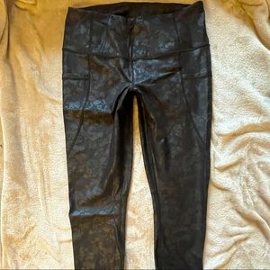 Yogalicious High waisted Leggings. Black, Shiny Floral print. Pockets. Size  M